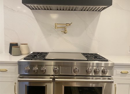 Atlanta Stainless Steel Hood with Brass Straps and Rivets