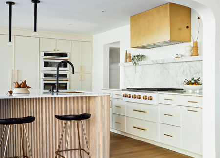 "Minneapolis" brass kitchen hood with smooth finish and angular body
