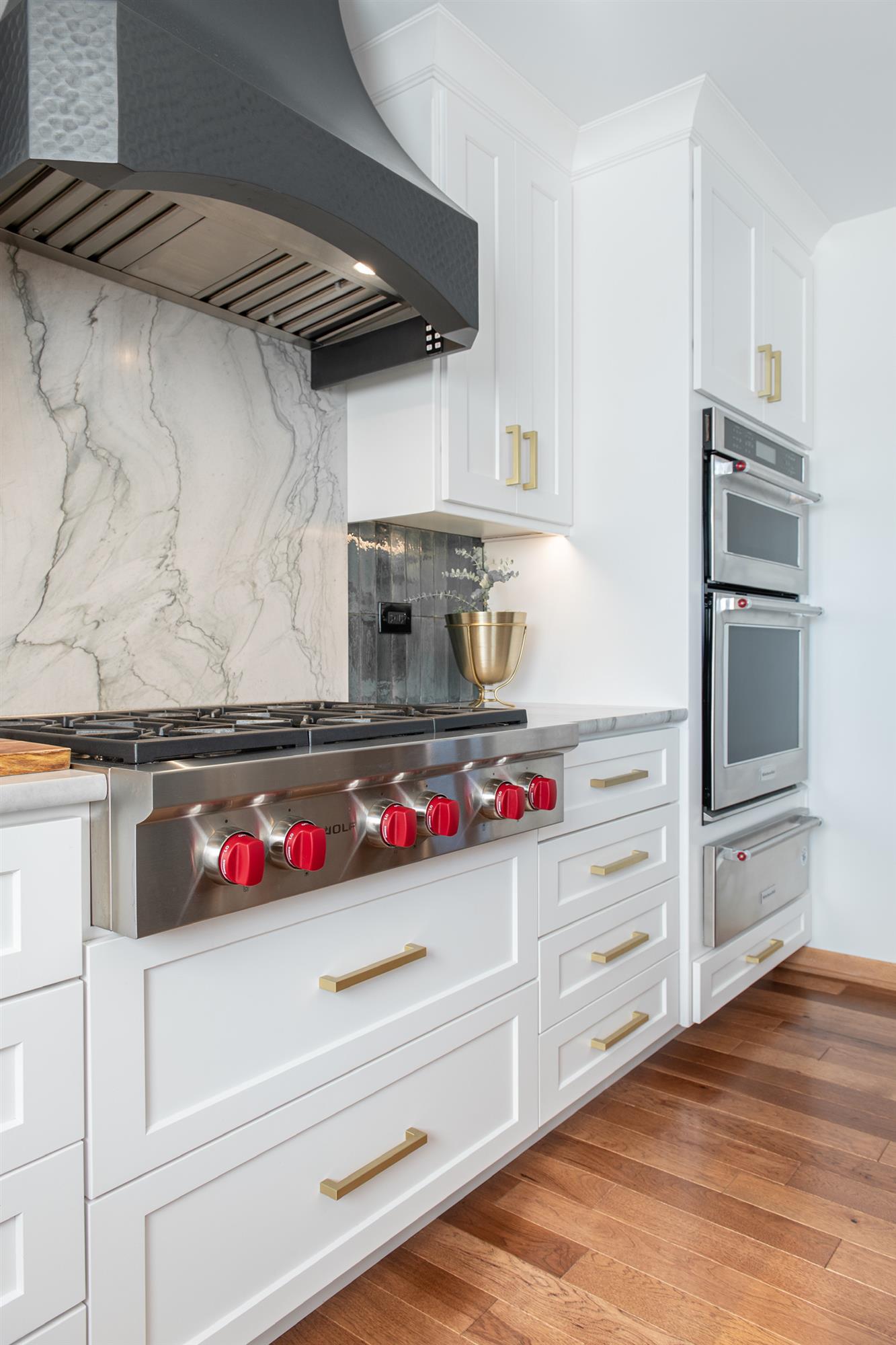 "Dallas" range hood closeup with soft hammered finish