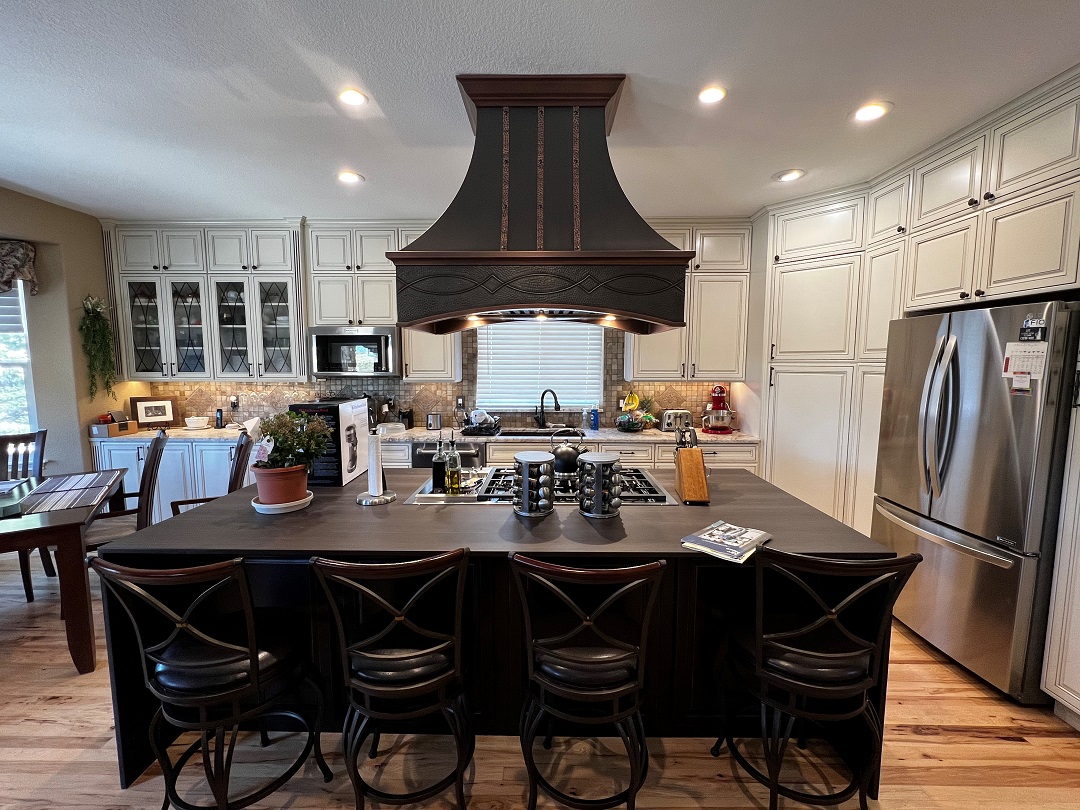 Antique copper hood with light copper straps & rivets